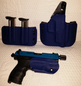 Here is a Walther P-22 with a beautiful blue belt holster and “Bikini” style holster.  Yes the threaded barrel is covered by the holster 